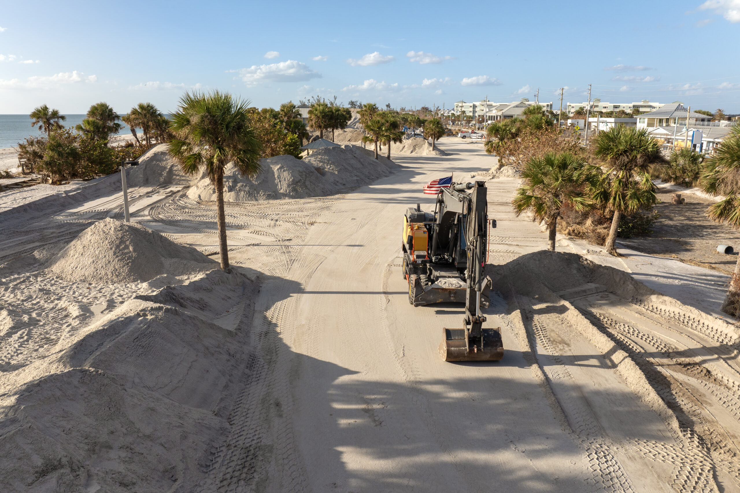 Hurricane Milton aftermath cleanup. Sand piles at Englewood Beach on Manasota Key. Sand recipient site after storm surge